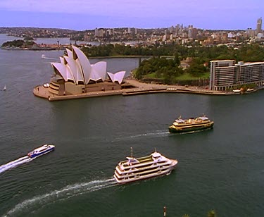 Sydney Harbour Bridge Opera house and beach with surfer