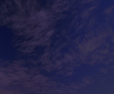 Blue sky and cloud to barren landscape