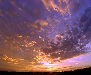 Various Dramatic Sunset clouds windmill