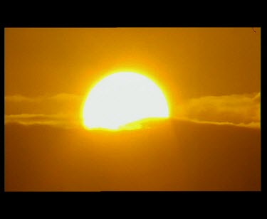 Big yellow sunset and clouds