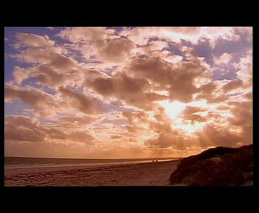 Beach clouds sunset.