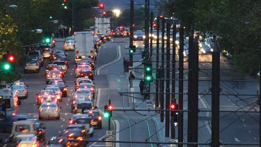 Glitters of red and white lights fill this hectic timelapsed traffic scene