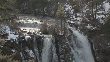 Powerful waterfall in winter