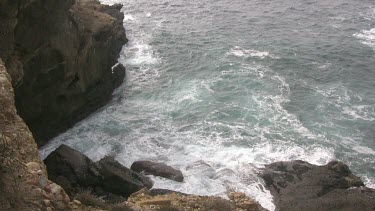 Looking down into the rocky shoreline