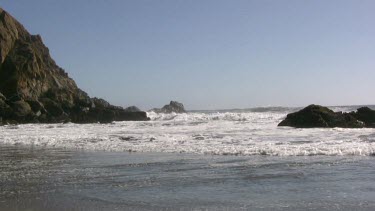 Waves crashing against the rocky shore