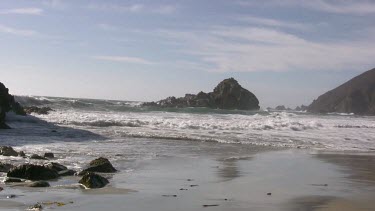 Waves crashing against the rocky shore