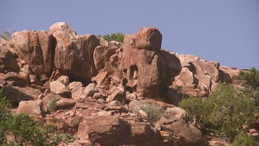 Rocky Canyon; sheer and deep; caves; buttes