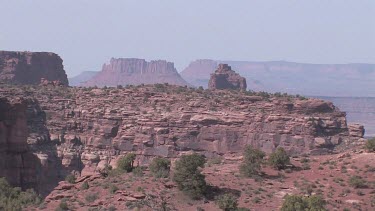 Rocky Canyon; sheer and deep; monumental buttes, boulders, and mesas