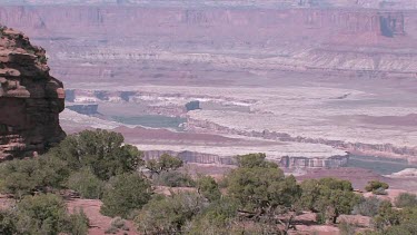 Rocky Canyon River; sheer and deep; monumental buttes, boulders, and mesas