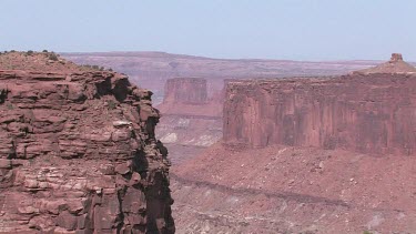 Rocky Canyon; sheer and deep; monumental buttes, boulders, and mesas