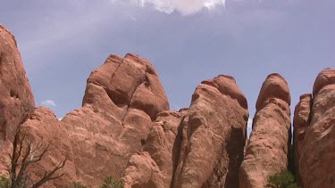 Rocky Canyon; sheer and deep; monumental buttes, boulders, caves, and mesas