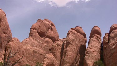 Rocky Canyon; sheer and deep; monumental buttes, boulders, caves, and mesas