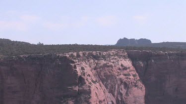 Rocky Canyon; sheer and deep; monumental buttes, boulders, and mesas