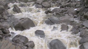 A rushing, cascading river in the Rocky Mountains