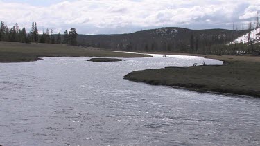 A Rocky Mountain river in early Spring; the Madison River