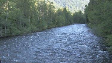 A river flows swiftly in the mountains; the Sacramento