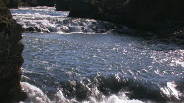 a fast flowing and dangerous mountain river