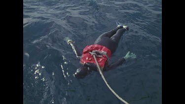 dummy floating face down in ocean