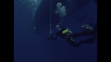 divers with boat equipment