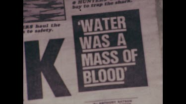 newpaper article, fear of sharks killer sharks