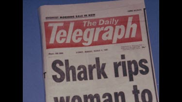 newpaper article, fear of sharks killer sharks