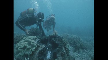 Ron and Valerie Taylor with giant clam