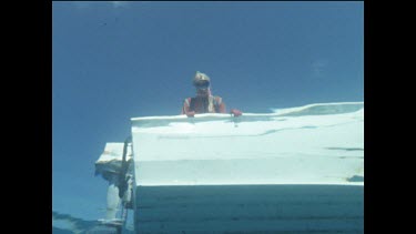 diver on boat shot from underwater