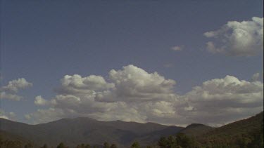 Timelapse of Boiling Clouds Over Mountains