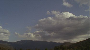 Timelapse of Boiling Clouds Over Mountains