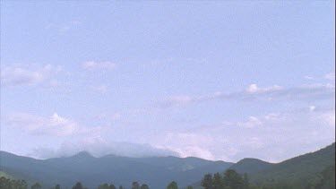 Timelapse of Boiling Clouds Over Mountains