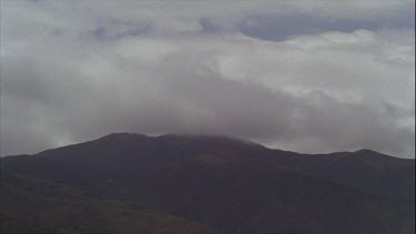 Timelapse of Boiling Clouds Over Mountains