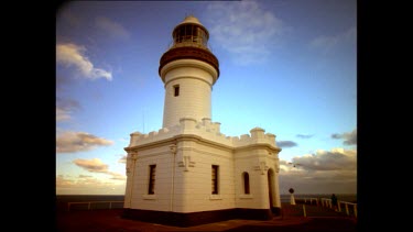 Byron Bay Lighthouse with hang glider in background.