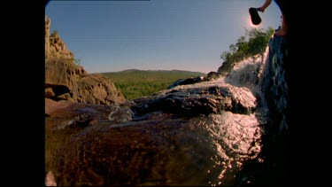 High Angle top of waterfall, water cascading down. Kakadu Jim Jim Falls