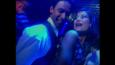 couple dancing in nightclub