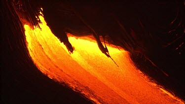 Volcano. Lava flow. Night