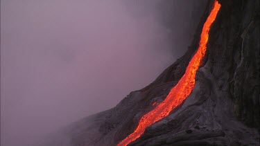Steam and lava flow. Recently solidified lava crust