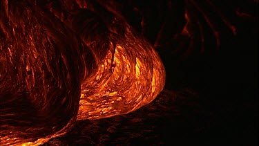 Incandescent lava erupting out of a fissure. Night.