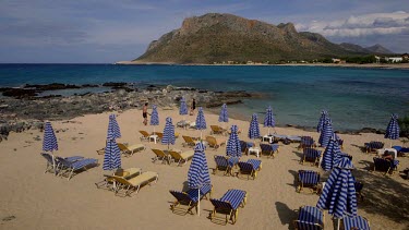 Parasols & Beach Near Stavros, Stavros, Crete, Greece, Europe