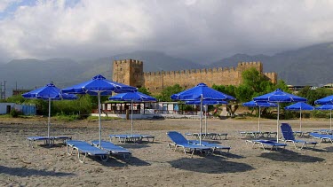 Blue Sun Beds, Parasols, Castle & Mountains, Frangokastello, Crete, Greece