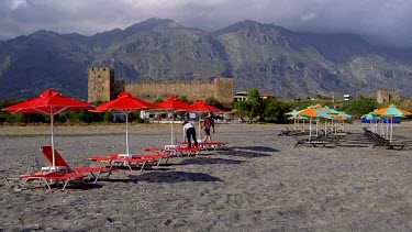 Red Sun Beds, Parasols, Castle & Mountains, Frangokastello, Crete, Greece