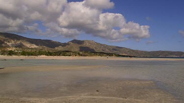 People Walking On Beach & Lagoon, Elafonisi, Crete, Greece