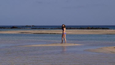 Teenage Girl In Blue Bikini, Elafonisi, Crete, Greece