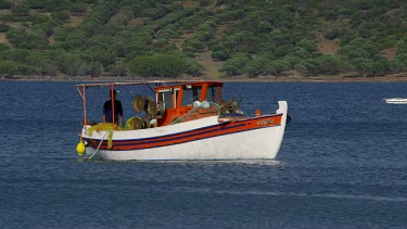 Fishing Boat Approaches Harbour, Elounda, Crete, Greece
