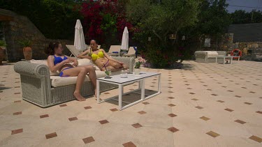 Mother & Daughter Drinking Cocktails, Elounda, Crete, Greece