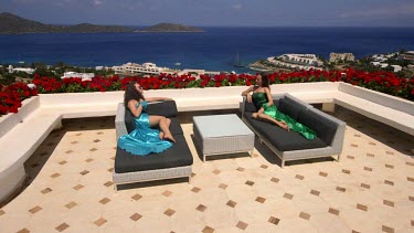 Teenage Daughter & Mother Relaxing, Elounda, Crete, Greece