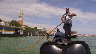 Gondolier On Gondola, Venice, Italy