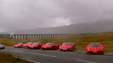 Red Ferrari 360 Spider, California 30, 458 Speciale, 458 Italia, 458 Spider Porsche Boxter Cars & Ribblehead Viaduct, Ribblehead, North Yorkshire, England