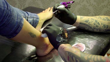 Tattooist Creates Red Rose Tattoo, Funchal, Madeira, Portugal