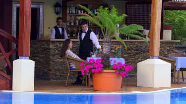 Waiters Serve Lady With Drinks, Funchal, Madeira, Portugal