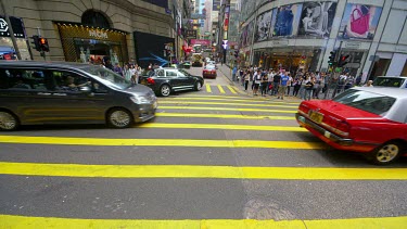 Pedestrians Crossing Queens Road At D'Aguilar Street, Central, Hong Kong, Asia